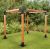 Pergola ogrodowa drewniana z metalowymi elementami